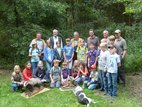 Gruppenbild mit Jägern und Hund